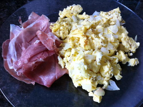 Scrambled eggs with onions and a side of prosciutto (3 eggs)