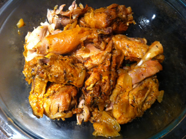 Slow cooker cooked chicken thighs with a tablespoon of paprika, garlic powder, onion, and pinch of salt
